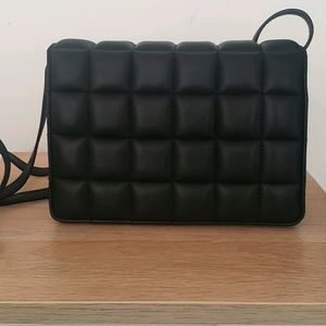 Black padded bag